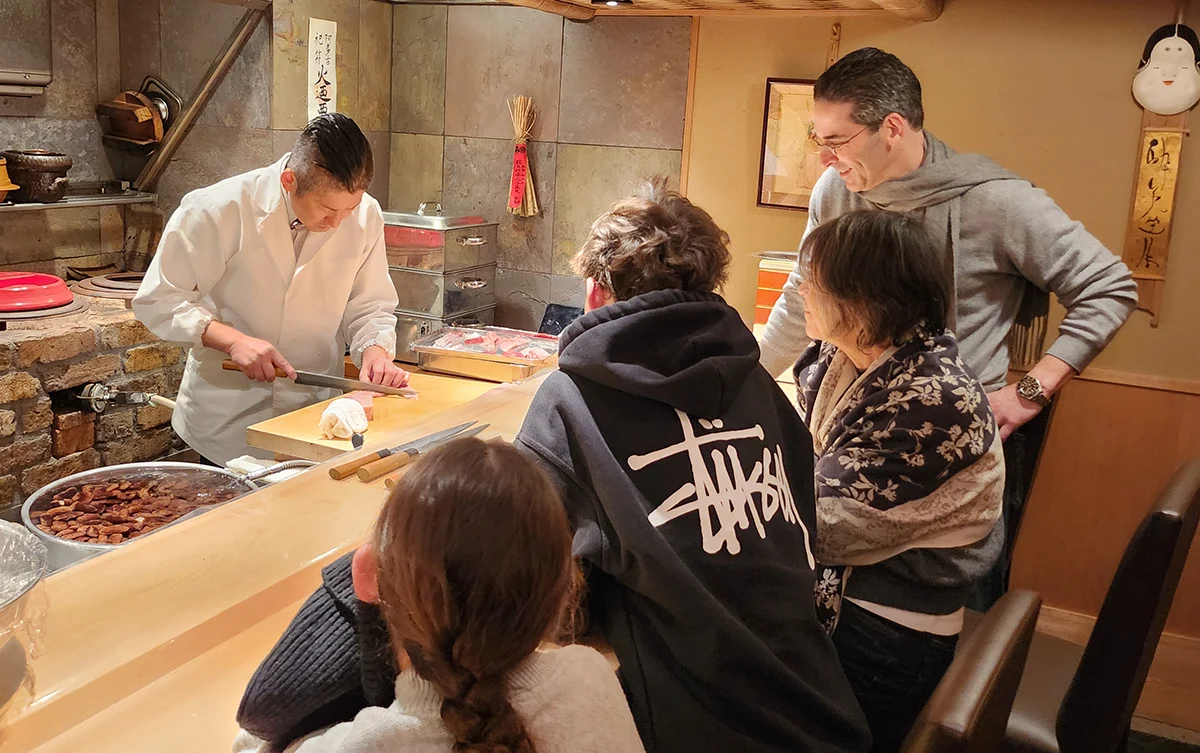 Chef teaching knife technique